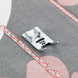 Piedino per cordoncini (5 fori) Brother