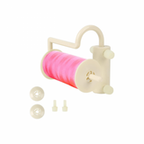 Adattatore porta-rocchetto orizzontale per filati speciali